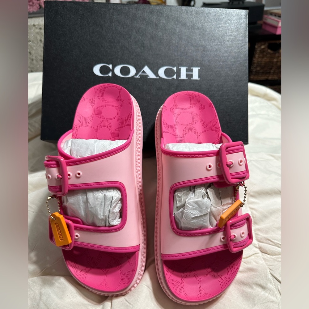 Coach “Lucy” sandal.  
Slip on
2" platform
